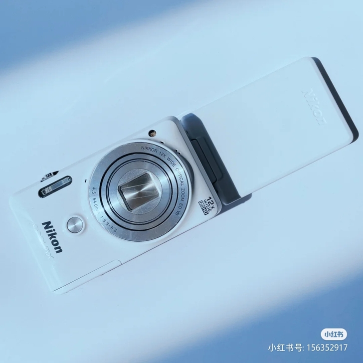 尼康s6900奶白机