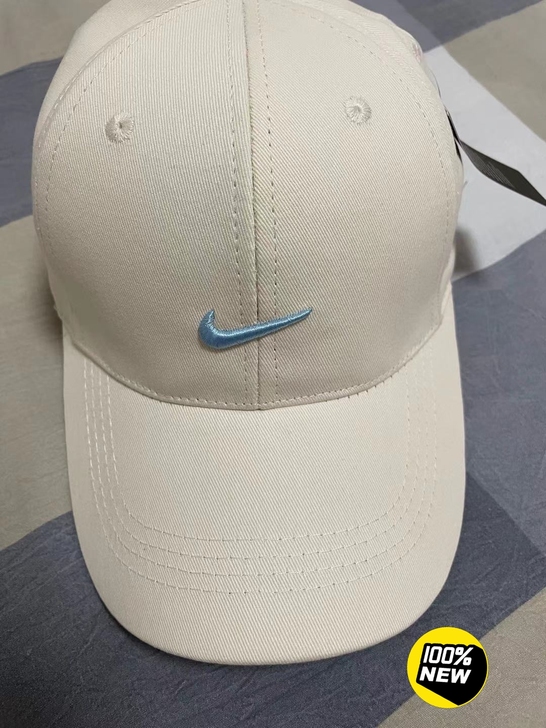 耐克米白色鸭舌帽小雏菊刺绣遮阳帽硬顶可调节...