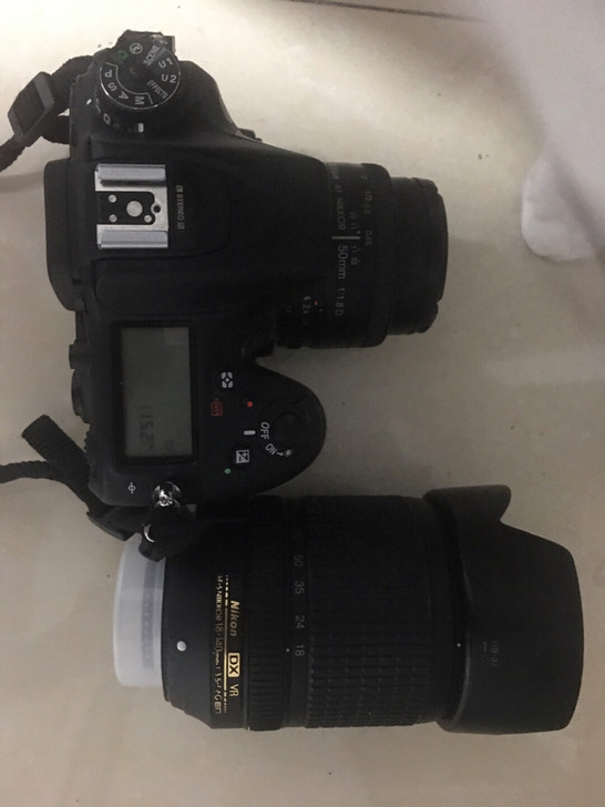 尼康D7100搭配18-140带个50小痰...