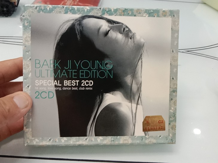 白智英 合辑歌曲2CD拆封,品相良好,有使...