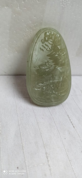 和田玉雕刻的山水画入手渠道：在古玩市场淘的，