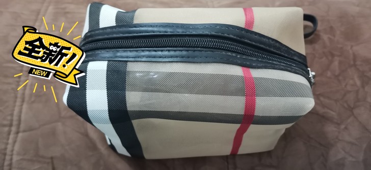 全新化妆包，买来没用过，里面有层防水层，实...
