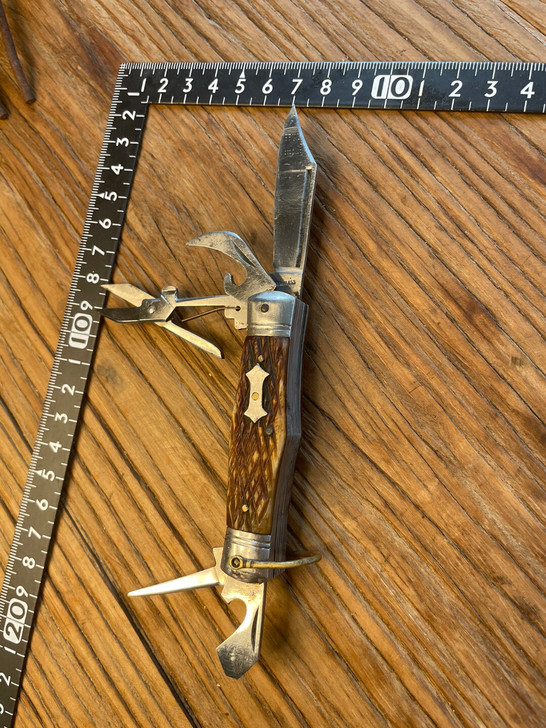 日本骨柄多功能小军刀。品相完美几乎全新，功...