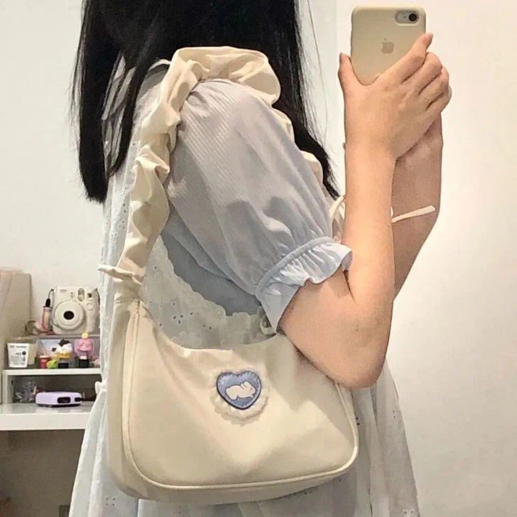 全新腋下包女夏单肩包新月包褶皱可爱抽绳手提包