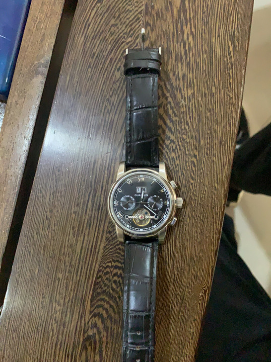 冠琴手表,全自动机械手表,不用上发条,没有...