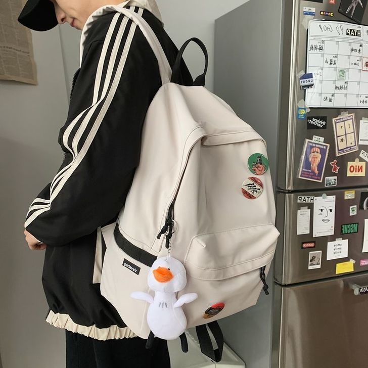 新款书包女大学生双肩包初中生简约大容量高中...