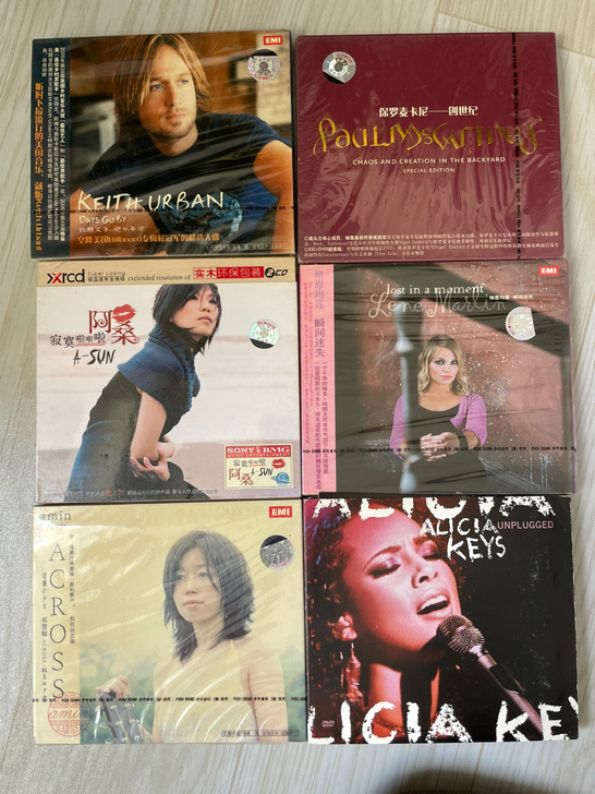 全新没开封cd唱片 碟片 就一盘打开的,剩...