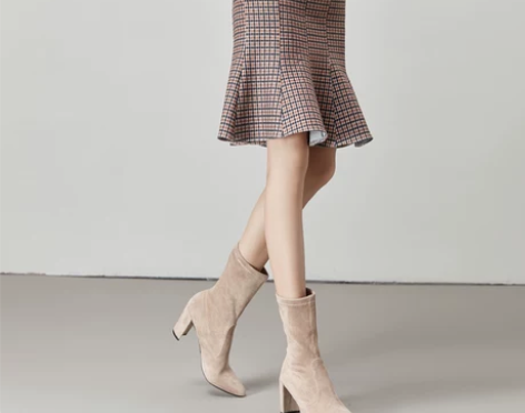 2018秋季新款半身裙中裙格子显瘦荷叶边包...