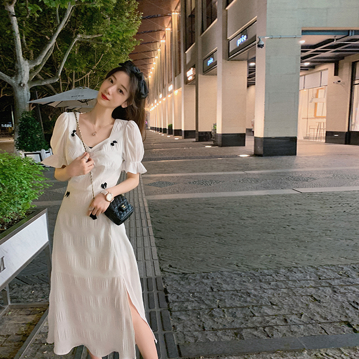 白色蝴蝶结连衣裙女2020年秋新款法式泡泡...