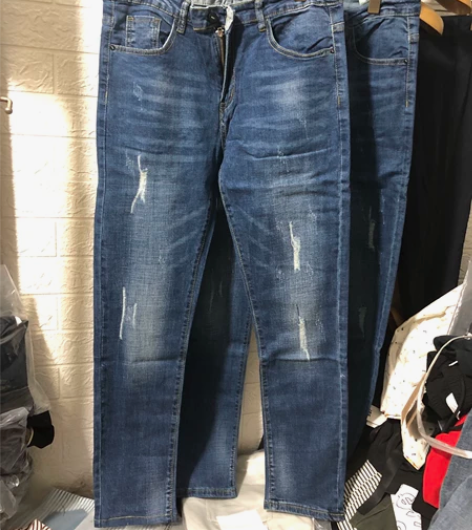 全新带弹力修身小脚蓝色做烂设计牛仔长裤特价...