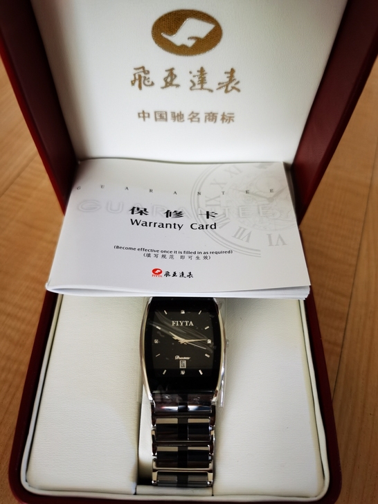 飞亚达G927超薄酒桶型黑盘钨钢+陶瓷材质...