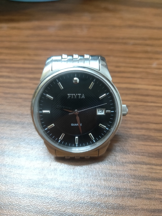 飞亚达手表，品牌型号 GJ084 WBW。
