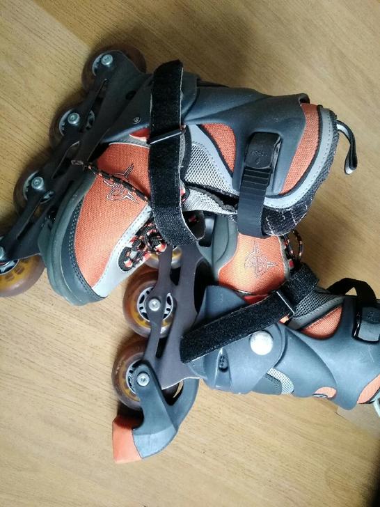 入门单排可调尺寸轮滑鞋33到36码，男款成...