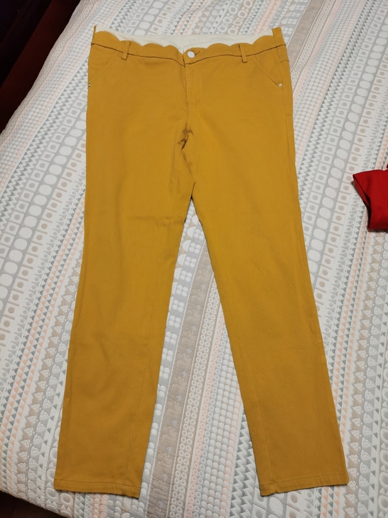 逸阳糖果色铅笔裤。