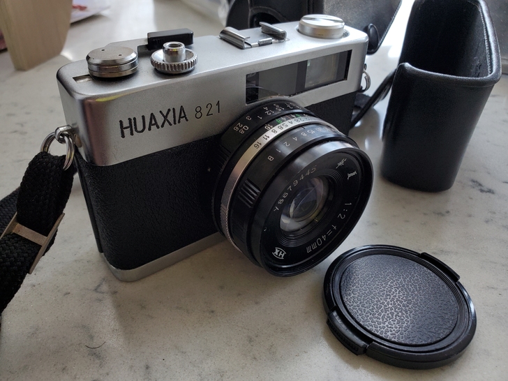 华夏821胶片旁轴相机，功能正常，黄斑对焦...