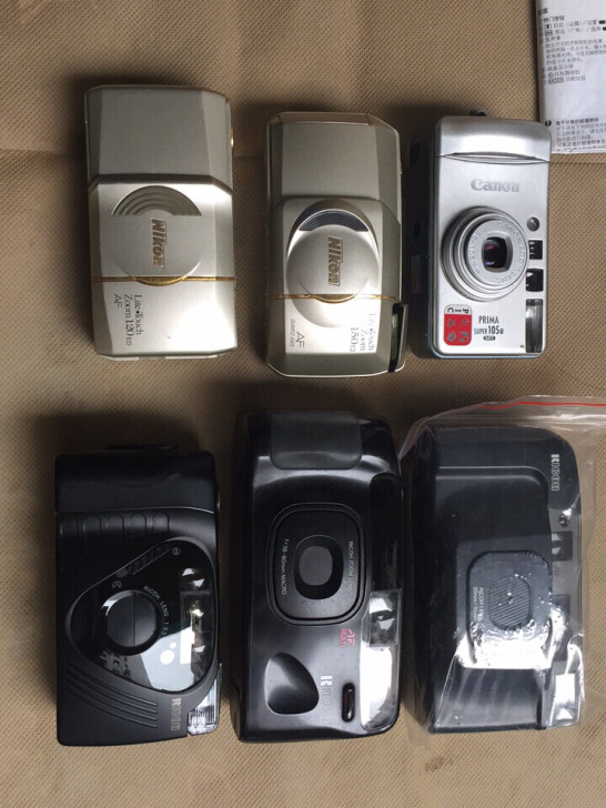 尼康 佳能 理光 胶卷相机问题机，要那台细...