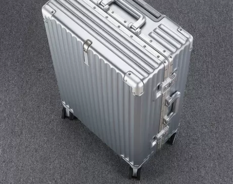 新款铆钉拉杆箱超大容量男女学生密码箱时尚潮...