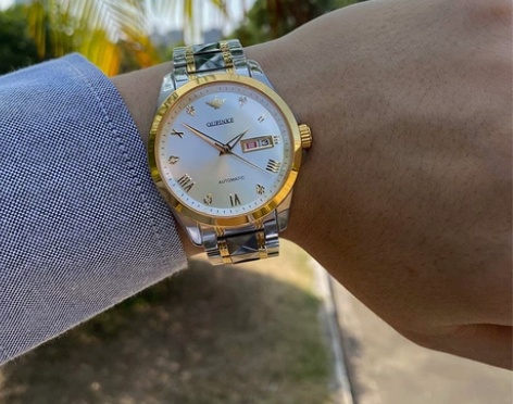 瑞士欧品客手表男机械表全自动夜光防水高档真...