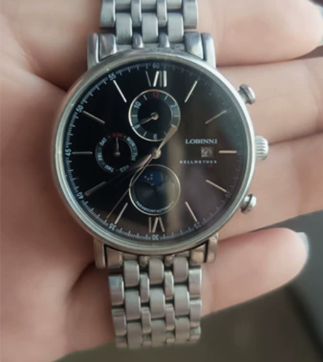 经典老品牌罗宾尼机械手表，产自瑞士。表身略...