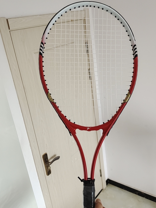 网球拍 送两个网球,放在家里没人玩