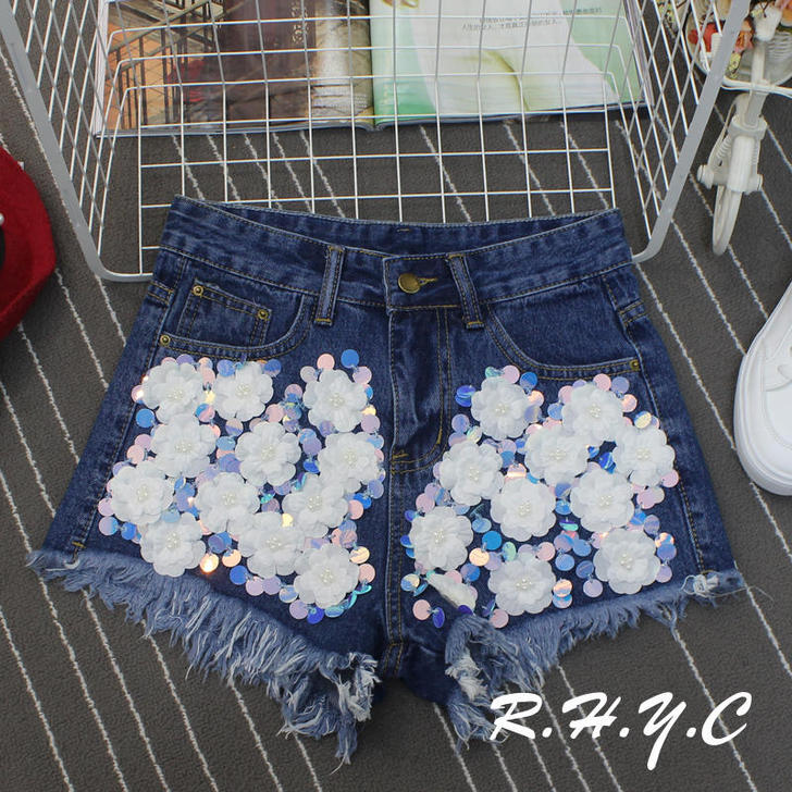 夏季新款时尚重工艺亮片钉珠牛仔短裤女毛边#...