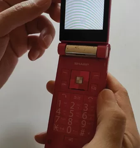 包邮【十分漂亮的夏普手机-屏幕可以旋转-型...