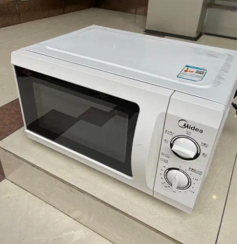 美的格兰仕九成新微波炉处理。家用公司 写字...