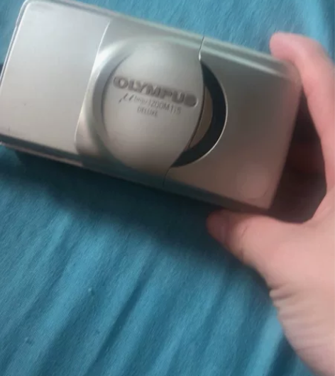 奥林巴斯照相机， Z00M115……，不退...