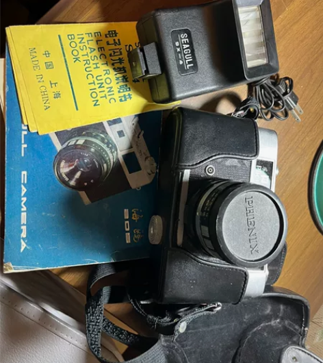 海鸥205凤凰205相机,送闪光带sx-4...