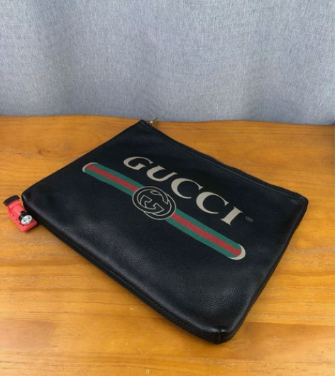 GUCCI古驰Print系列男士小号手拿袋...