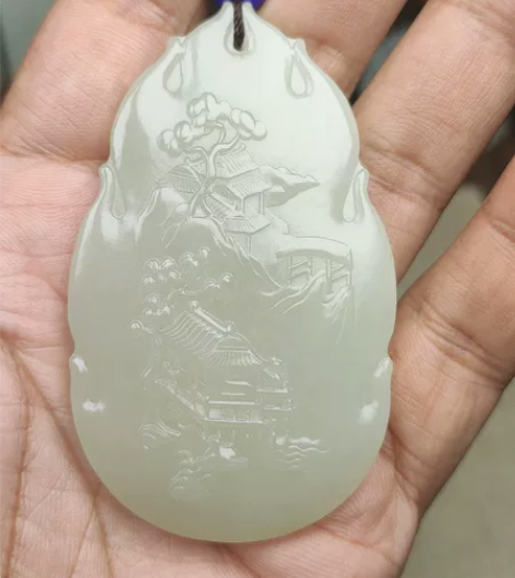 新疆和田玉山料山水牌玉雕挂件 感兴趣的话点...