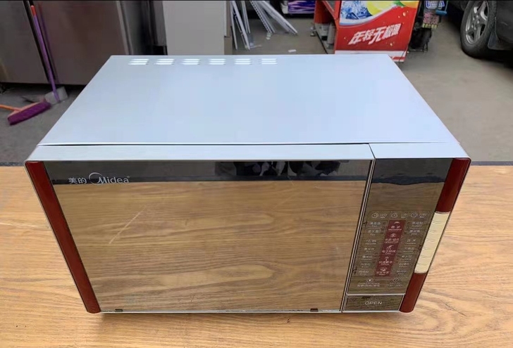 低价转让美的微波炉12台不锈钢内胆几乎全新...