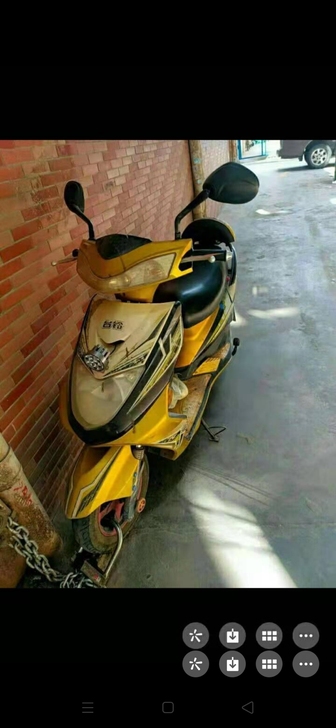 台铃原装电动车,外表有点旧,但是车长得结实...