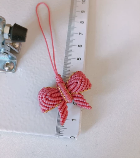 手编立体小蝴蝶结手机挂绳包挂 感兴趣的话点...
