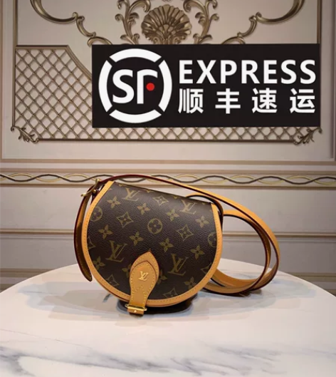 圆饼手提包 复古风潮，再现 手袋之韵。帆布...