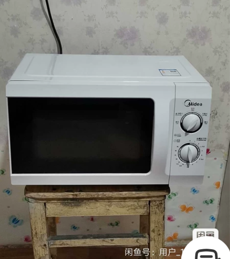 转出9成新美的微波炉一台 这款微波炉里面是...