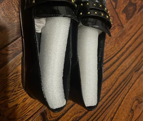 Daphne/达芙妮秋季新款时尚铆钉平底鞋...