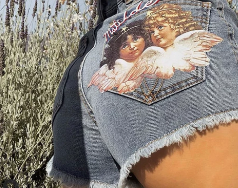 ?没穿过新款欧美复古高腰显瘦天使印花毛边牛...