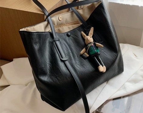 ?天彩翼飞 女士包 皮质超软 手感不错 感...