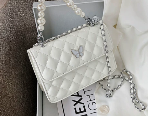 夏天珍珠链包包女2021新款潮时尚菱格链条...