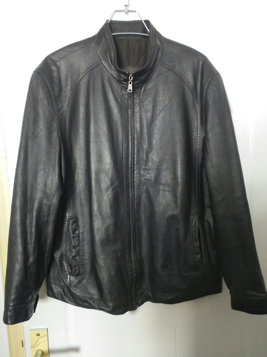 绵羊皮 深棕色 9新无破损 皮面柔软 内外...