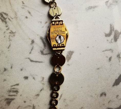 原新世纪商场正宗瑞士原装手表黄金色永不褪色...