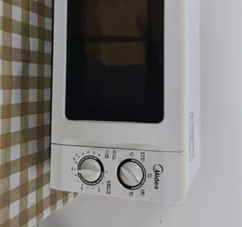 闲置的微波炉,加热饭菜快,无维修无问题正常...