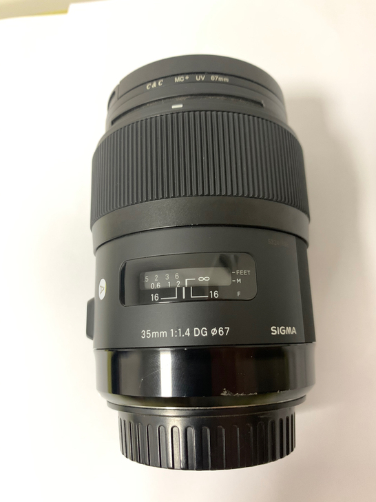出适马35mm1.4自用佳能镜头，带一个保...