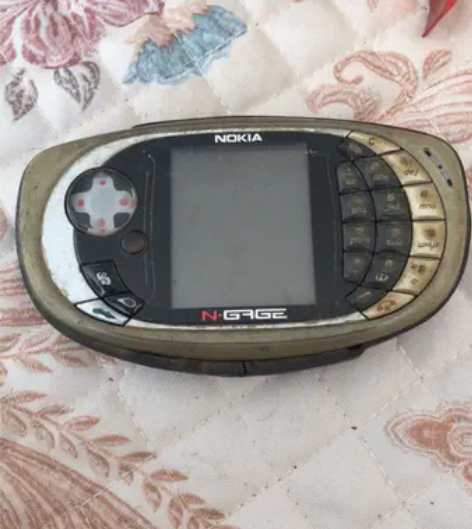 诺基亚QD游戏手机,无法开机,没电池没法测...