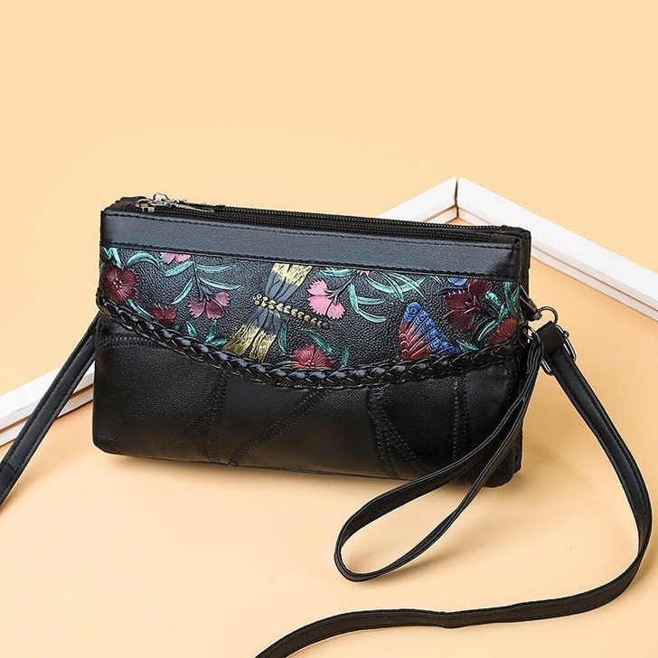 朋友实体店不做了还剩下一批真皮斜挎包，亏本...