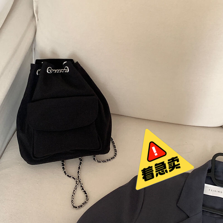 乌77简约休闲绸布黑色链条水桶包韩版抽 绳...