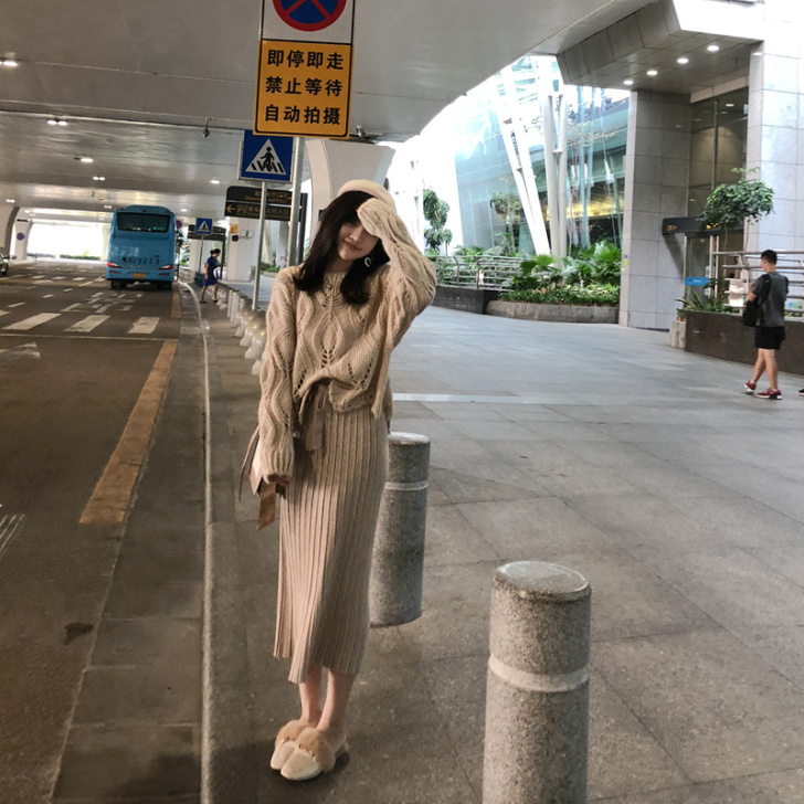 [出运费即送]高腰包臀裙中长款针织黑色半身...