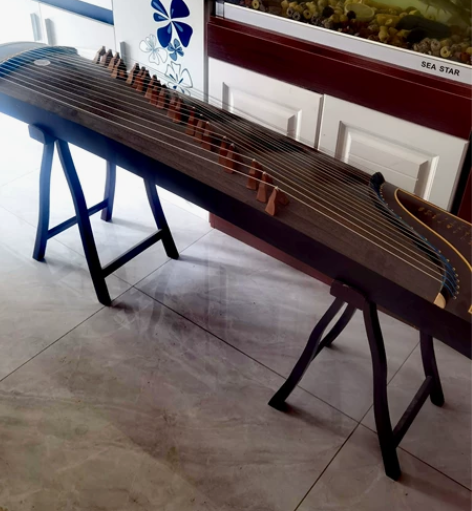 品质演奏考级专业古筝特价转让，只需要换一根...