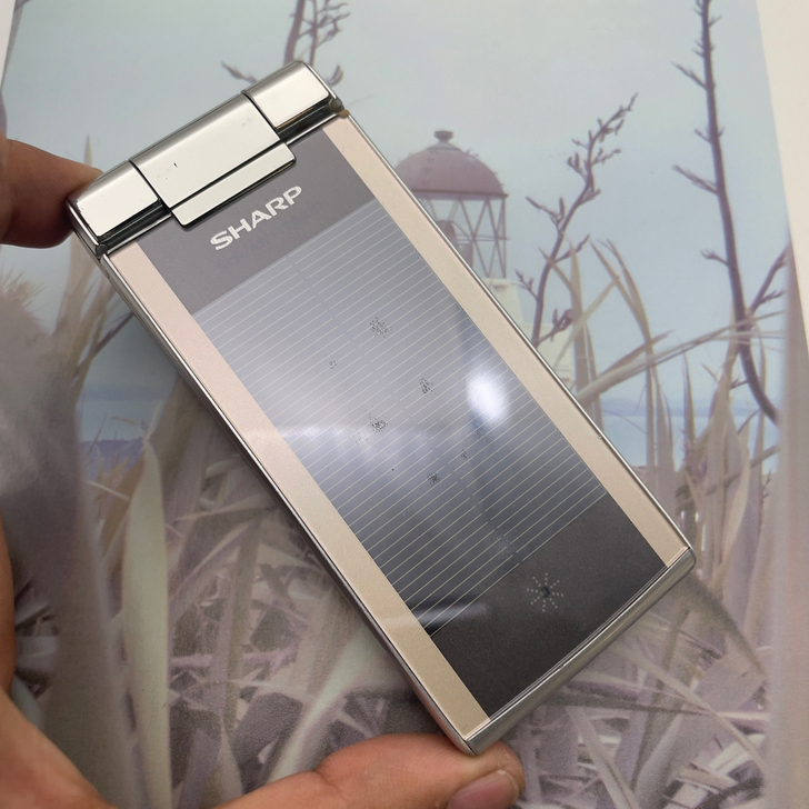 夏普 SH805uc 夏普翻盖手机 太阳能...